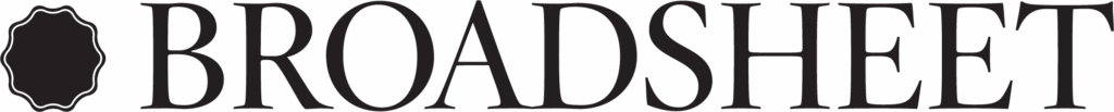 The word BROADSHEET in bold, uppercase serif font, with a decorative black emblem resembling a seal or badge to the left of the text.