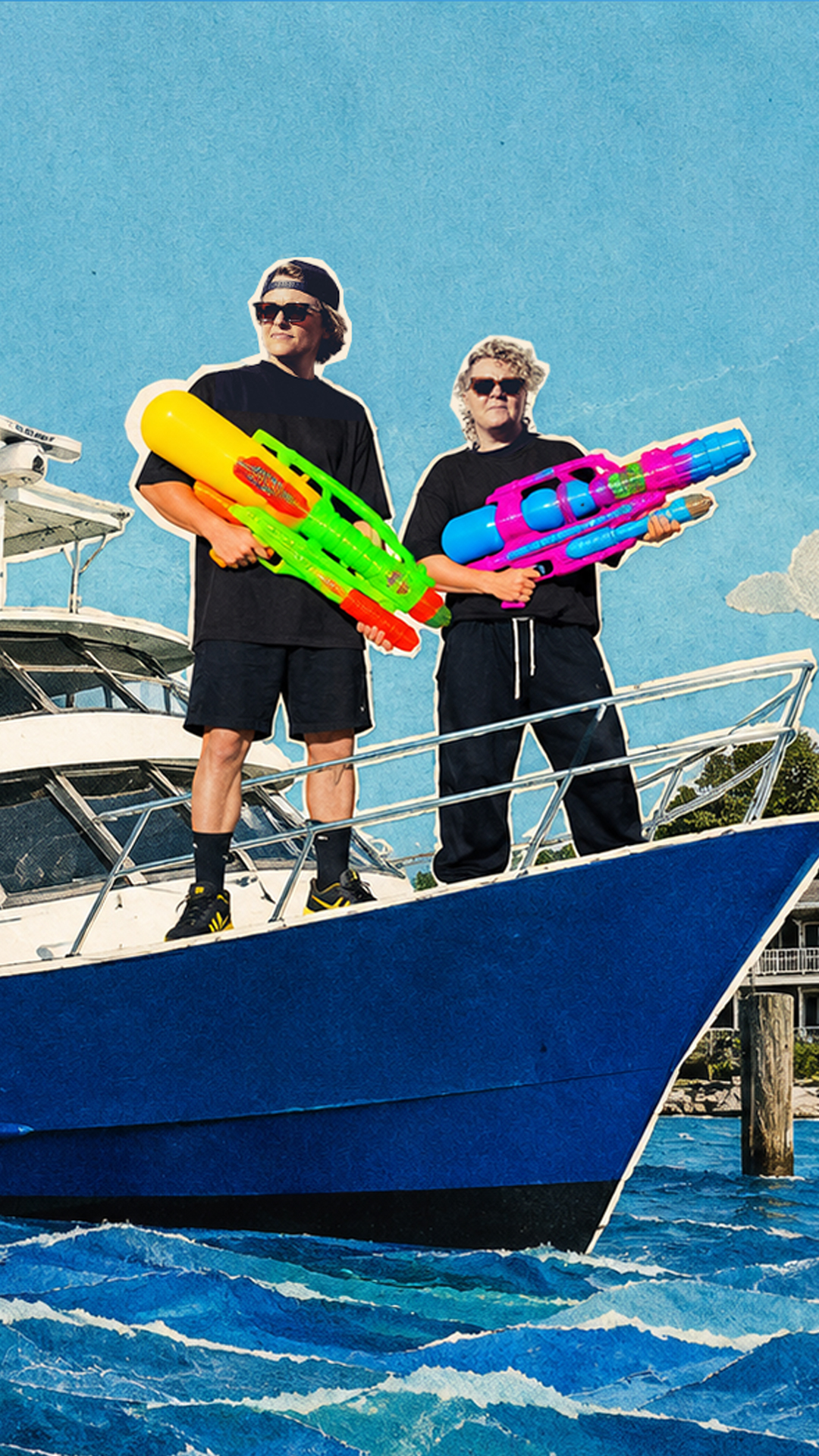 Two people in black outfits stand on a blue boat holding colorful water guns, with a blue sky and water in the background.