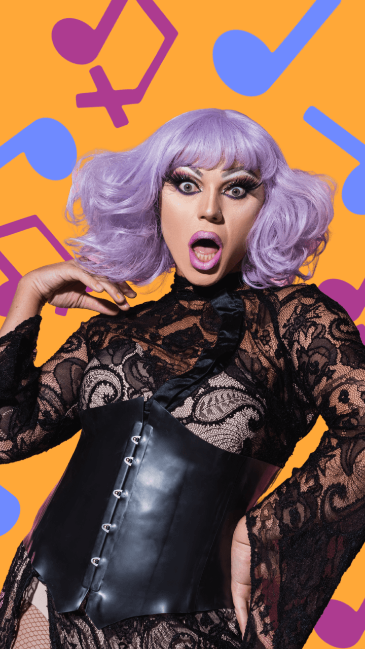 A person in a lavender wig and dramatic makeup wears a black lace outfit with a leather corset, posing with a surprised expression. The background is orange with large blue and purple music notes and Venus symbols.