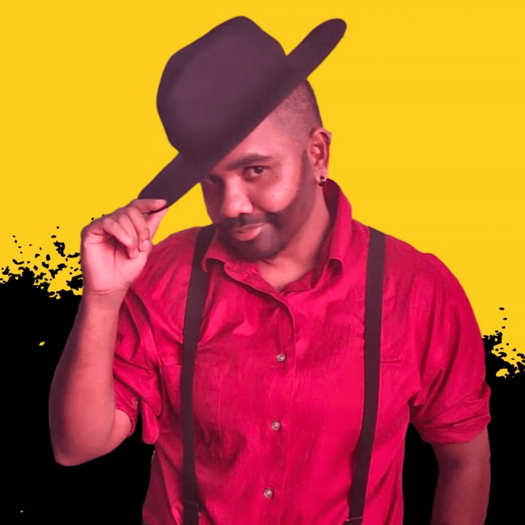 A person in a red button-down shirt and suspenders tips a brown fedora hat against a yellow background.